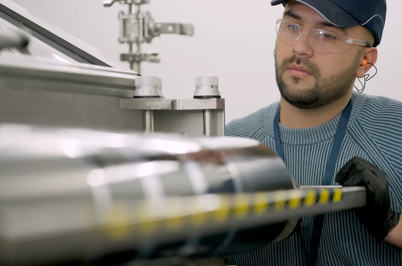 A Natron employee working in the manufacturing facility